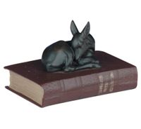 Deer Fawn Statue On A Book